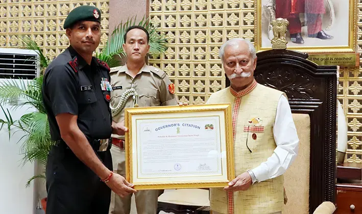 Guv presents citation to subedar & honorary lieutenant