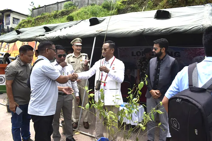 Cherry blossom saplings distributed, child helpline number unveiled
