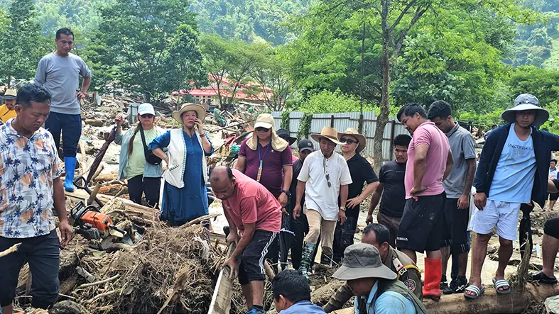 Search intensifies for four people missing in flash flood