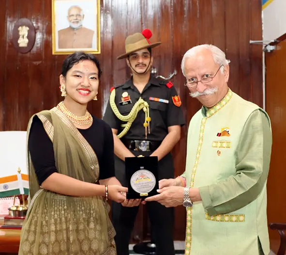 Guv presents ‘Land of the Rising Sun’ medallion to Manami Moyir Gamlin